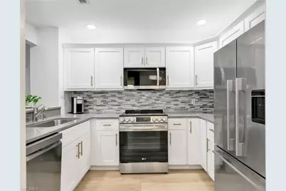 201 Arbor Lake Dr #2-107, Naples, FL 34110 - Photo 2