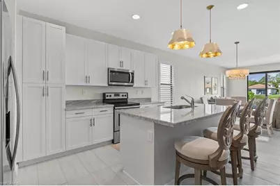 8968 Madrid Cir, Naples, FL 34104 - Photo 2