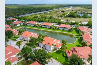25064 Peacock Ln #101, Naples, FL 34114 - Photo 2