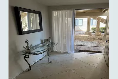 64 4th St #D104, Bonita Springs, FL 34134 - Photo 2