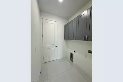 718 Chattman St E, Lehigh Acres, FL 33974 - Photo 18