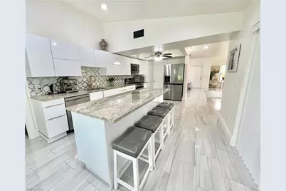 2499 River Reach Dr, Naples, FL 34104 - Photo 14