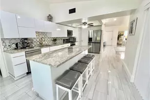 2499 River Reach Dr, Naples, FL 34104 - Photo 14