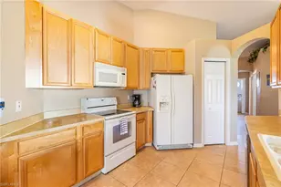 6894 Sterling Greens Ct, Naples, FL 34104 - Photo 14