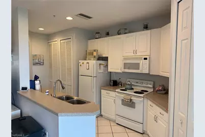 1420 Sweetwater Cv #102, Naples, FL 34110 - Photo 8