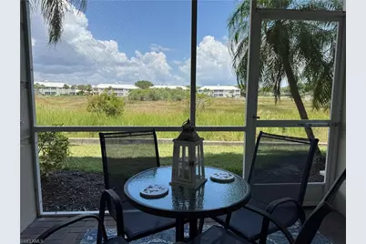 1420 Sweetwater Cv #102, Naples, FL 34110 - Photo 1