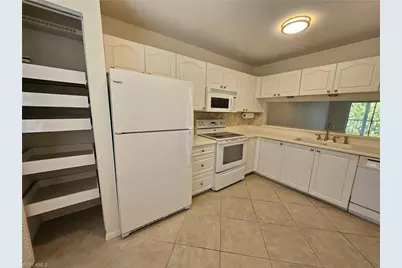 3001 Sandpiper Bay Cir #B202, Naples, FL 34112 - Photo 6