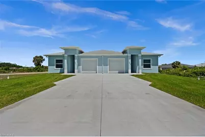 301/303 Pennfield St, Lehigh Acres, FL 33974 - Photo 1