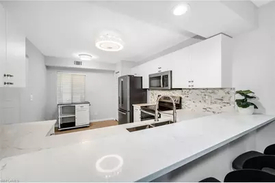 925 New Waterford Dr #104, Naples, FL 34104 - Photo 10