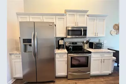 25240 Pelican Creek Cir #202, Bonita Springs, FL 34134 - Photo 8