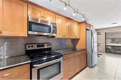236 Pebble Beach Cir #A202, Naples, FL 34113 - Photo 8