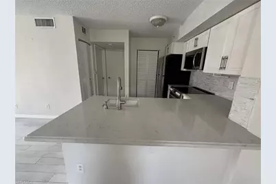 1260 Wildwood Lakes Blvd #107, Naples, FL 34104 - Photo 6