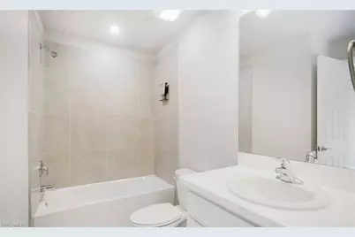 15100 Wildflower Cir, Naples, FL 34119 - Photo 10