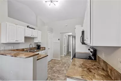 2409 E Edgewater Way, Lehigh Acres, FL 33936 - Photo 14
