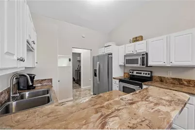 2409 E Edgewater Way, Lehigh Acres, FL 33936 - Photo 16