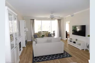 7655 Pebble Creek Cir #302, Naples, FL 34108 - Photo 2