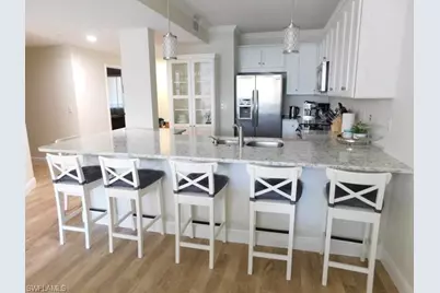 7655 Pebble Creek Cir #302, Naples, FL 34108 - Photo 4