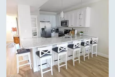 7655 Pebble Creek Cir #302, Naples, FL 34108 - Photo 26
