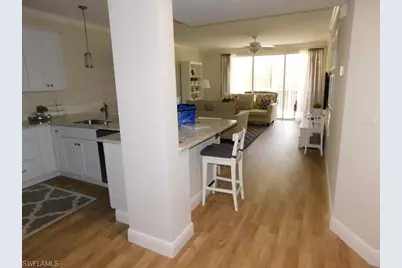 7655 Pebble Creek Cir #302, Naples, FL 34108 - Photo 14
