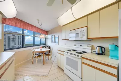6000 Pelican Bay Blvd #1202, Naples, FL 34108 - Photo 22
