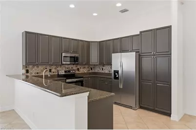 2009 Isla De Palma Cir, Naples, FL 34119 - Photo 30