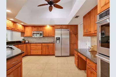 2108 Imperial Golf Course Blvd, Naples, FL 34110 - Photo 12