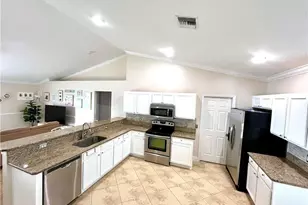 2720 NE 1st Pl, Cape Coral, FL 33909 - Photo 10