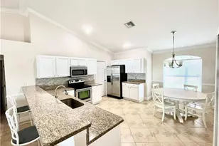 2720 NE 1st Pl, Cape Coral, FL 33909 - Photo 8