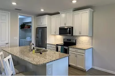 14927 Edgewater Cir, Naples, FL 34114 - Photo 2