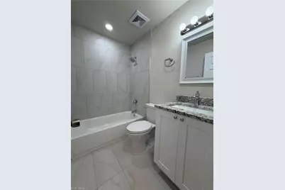 2601 47th Ter SW #B, Naples, FL 34116 - Photo 12