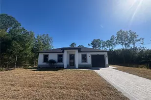 748 Chattman St E, Lehigh Acres, FL 33974 - Photo 1