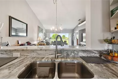 9165 Michael Cir #1002, Naples, FL 34113 - Photo 12