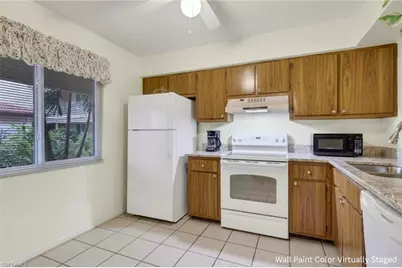 1025 Foxfire Ln #110, Naples, FL 34104 - Photo 2