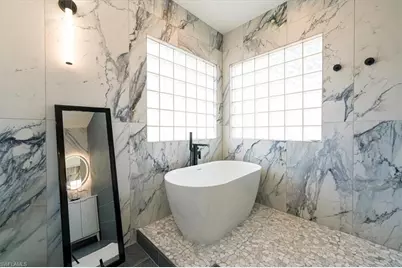 7703 Martino Cir, Naples, FL 34112 - Photo 26