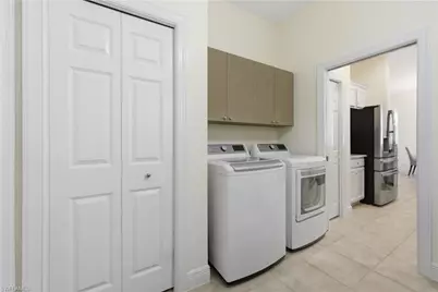 9235 Troon Lakes Dr, Naples, FL 34109 - Photo 28