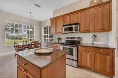 9029 Whimbrel Watch Ln #202, Naples, FL 34109 - Photo 6