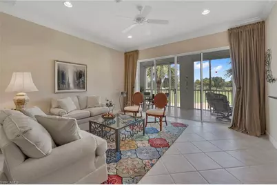9029 Whimbrel Watch Ln #202, Naples, FL 34109 - Photo 4