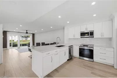 1330 Derbyshire Ct #E101, Naples, FL 34116 - Photo 2