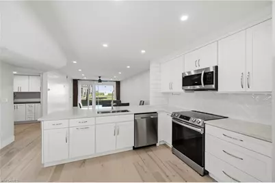 1330 Derbyshire Ct #E101, Naples, FL 34116 - Photo 6