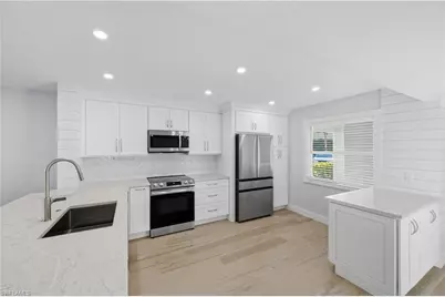 1330 Derbyshire Ct #E101, Naples, FL 34116 - Photo 4