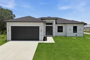 765 Chambers St E, Lehigh Acres, FL 33974 - Photo 1