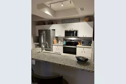 2815 Cypress Trace Cir #102, Naples, FL 34119 - Photo 4