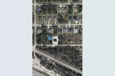 2712 54th St SW, Lehigh Acres, FL 33976 - Photo 1