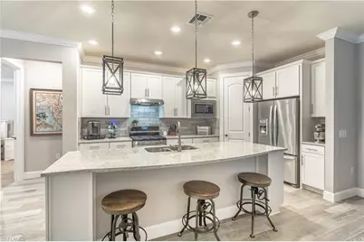 7473 Winding Cypress Dr, Naples, FL 34114 - Photo 2