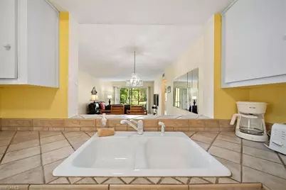 1001 Foxfire Ln #102, Naples, FL 34104 - Photo 10