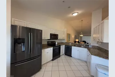 9009 Michael Cir #1-110, Naples, FL 34113 - Photo 4