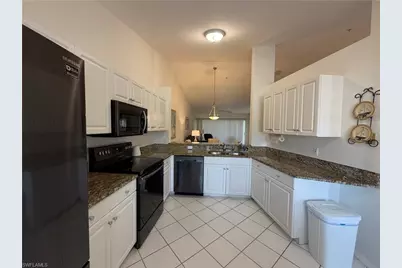 9009 Michael Cir #1-110, Naples, FL 34113 - Photo 6