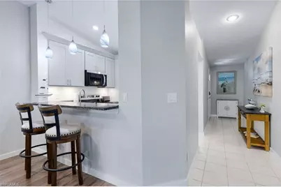 810 New Waterford Dr #203, Naples, FL 34104 - Photo 10