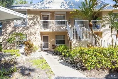 138 Pebble Shores Dr #201, Naples, FL 34110 - Photo 1