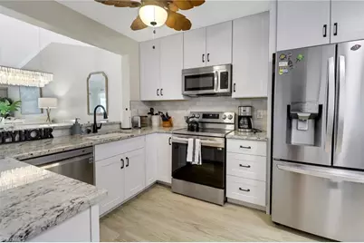 1358 Derbyshire Ct #F201, Naples, FL 34116 - Photo 6